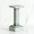 Standing white wooden pedestal stand against white background