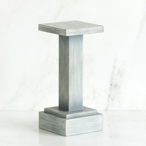 Standing white wooden pedestal stand against white background