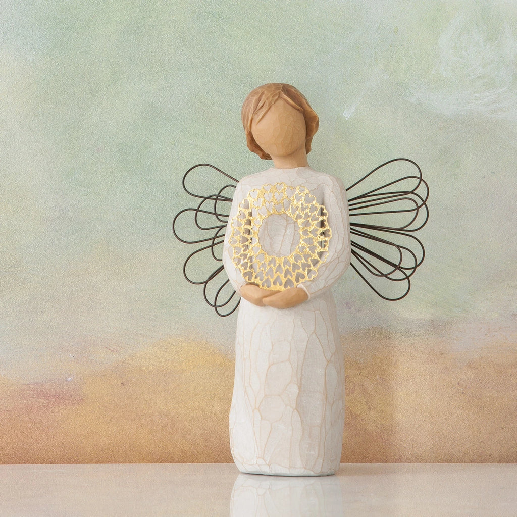 Willow Tree Sweetheart, 5.5" hand-painted resin angel figure in cream dress with wire wings, holding gold-leafed metal wreath of hearts, in front of light blue painting