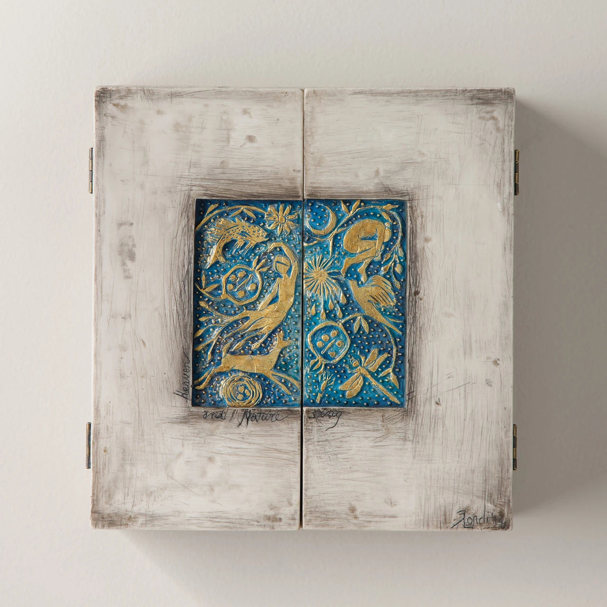 Willow Tree Starry Night Nativity, 8.5”h x 8”w x 2”d resin triptych with hinged doors, cream exterior with gold and blue details, doors open to 16”w with interior bas-relief Nativity scenes