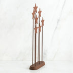 Bronze plaque with star stands on top of it