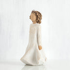 Side view of brunette woman wearing white dress standing up