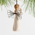 Back view female angel figure with wire wings holding wire circle with "thank you" written in wire inside of it, ornament loop on figure's head