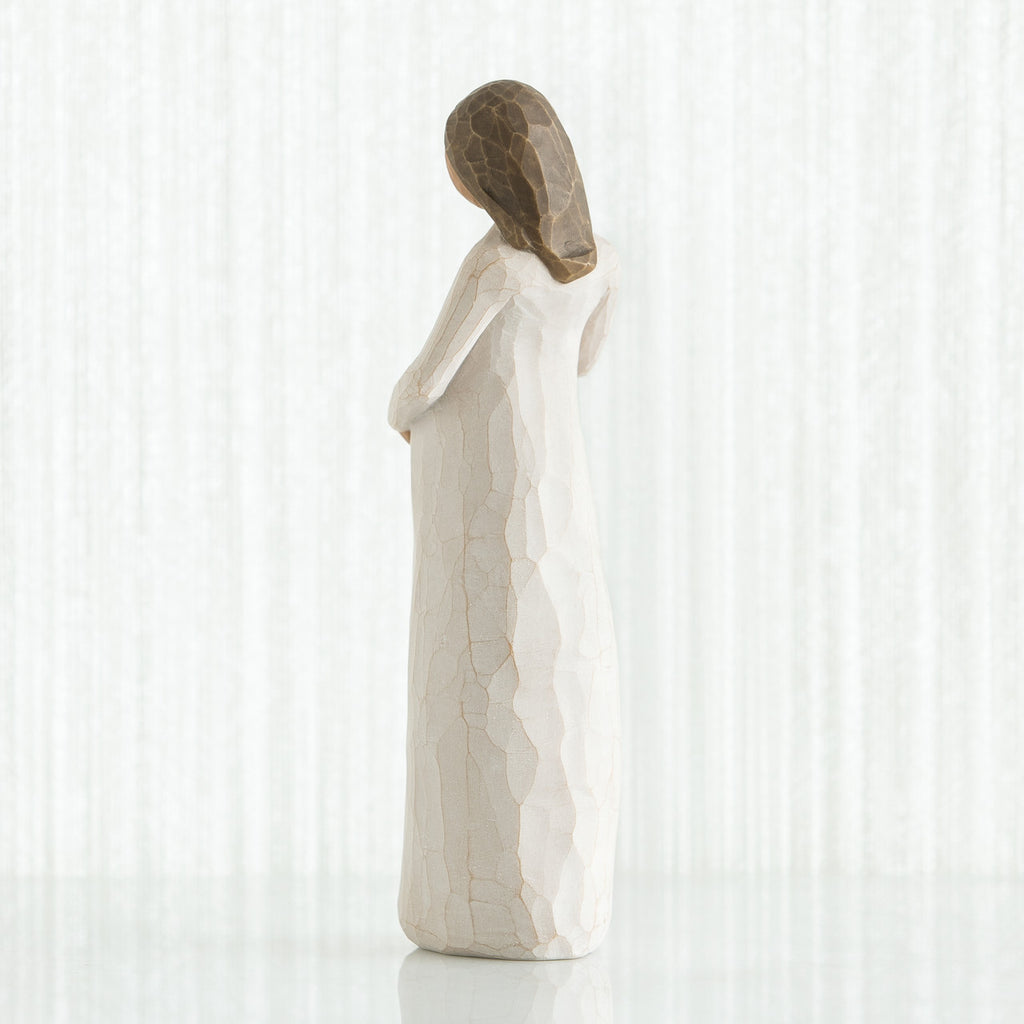 Back view of brunette girl in white dress