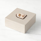 Side view: hand-painted cream square wood box, with hinged lid