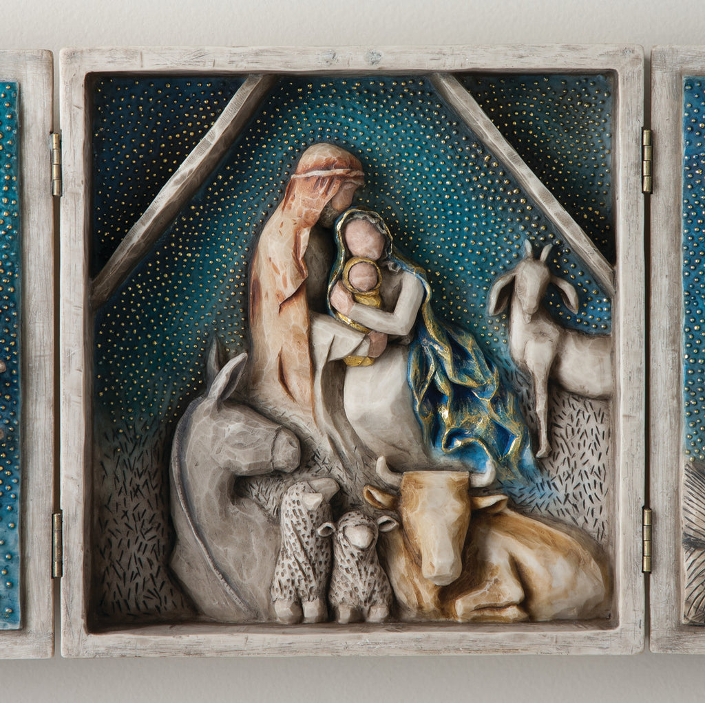 A hinged resin box, done in a Willow Tree format that tells the story of the Nativity