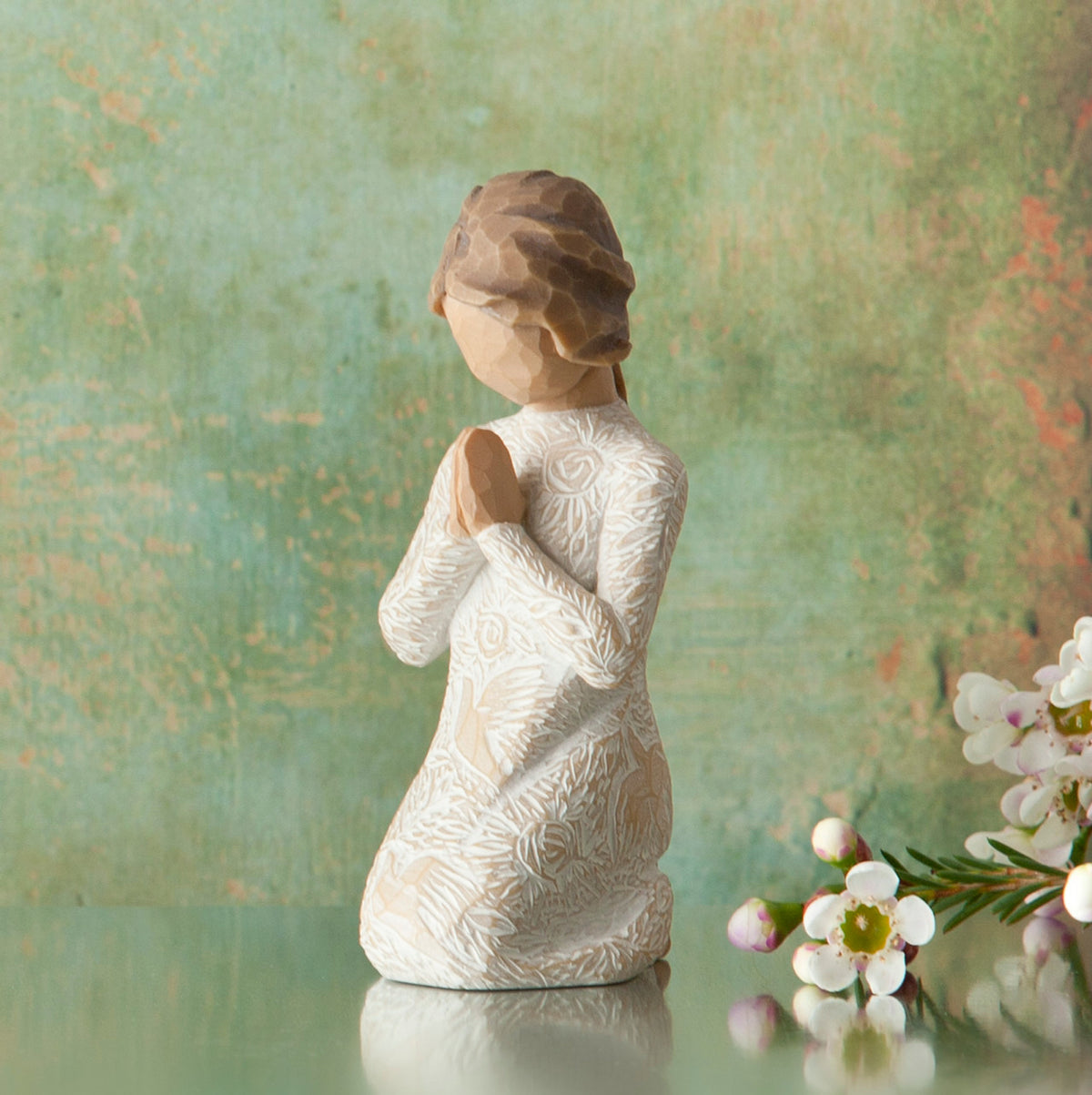 Willow Tree Prayer of Peace, 4”h hand-painted kneeling figure in cream dress heavily carved with birds and flowers, hands in prayer pose, in front of moss green painting